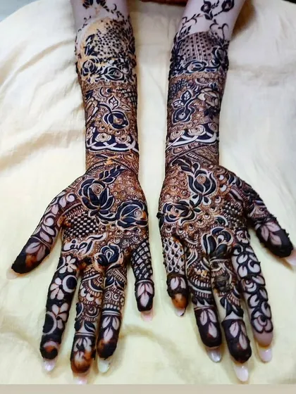 Another look at this floral bridal design, showing how the pattern flows from the palm to the arm.