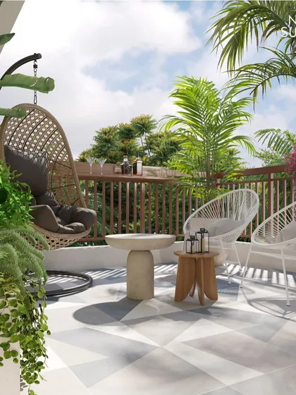 We transformed this urban terrace into a chic oasis for relaxation. The design combines a comfortable rattan swing chair with modern wireframe seating, set against a backdrop of dense palm leaves and a geometric tiled floor, creating a perfect spot for morning coffee or evening drinks.