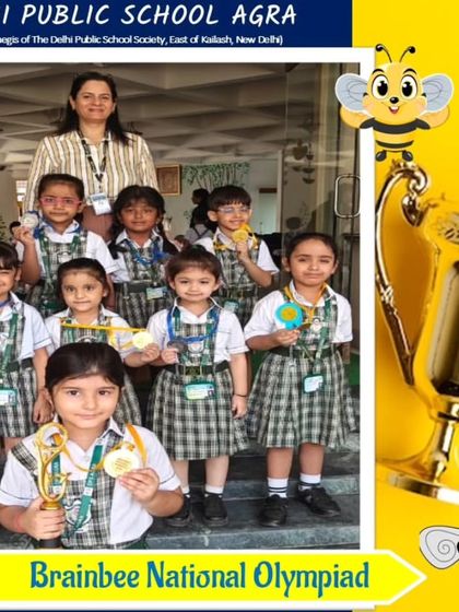 Young artists from the Drawing and Colouring competition (Group A) at DPS Agra with their 2024 Olympiad awards.