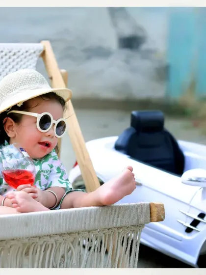 Chilling out in style. This beach-themed setup with a deck chair, toy car, and cool shades is perfect for a relaxed and fun summer vibe photoshoot.