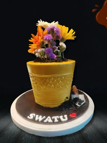 For the person with a green thumb, I designed this cake to look exactly like a flower pot. The "dirt" is edible, and the pot is filled with beautiful, fresh flowers.