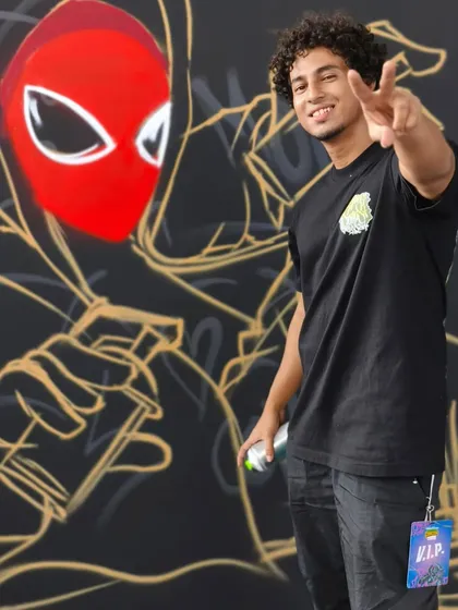 Posing with my Spider-Man artwork at Comic-Con. It's always great to meet fellow fans and share my love for these characters.