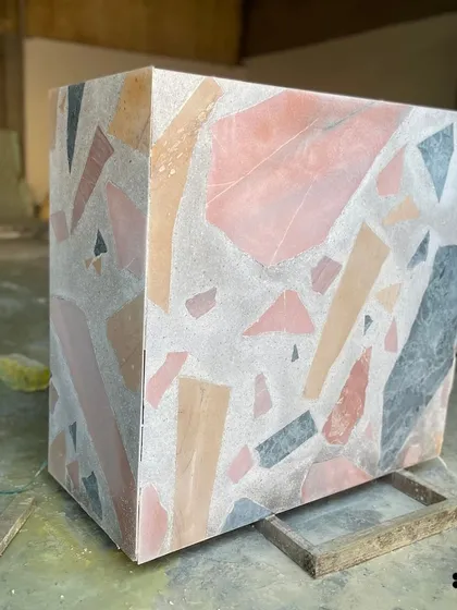 A beautiful Venetian terrazzo slab with large Indian Natural Stone chunks. This shows how we can create bold, custom patterns for any project.