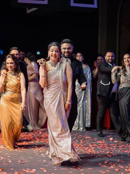 A grand entrance onto the dance floor surrounded by friends and family. This is how you kick off an unforgettable performance.