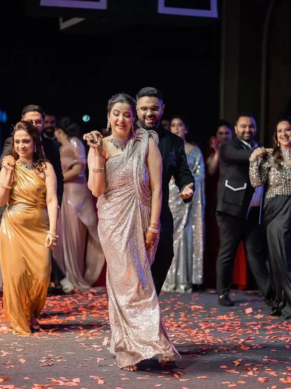 A grand entrance onto the dance floor surrounded by friends and family. This is how you kick off an unforgettable performance.