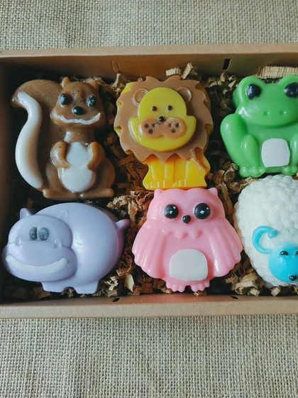 A box of six different animal soaps, including a squirrel, lion, frog, hippo, owl, and sheep. A great gift for an animal lover.