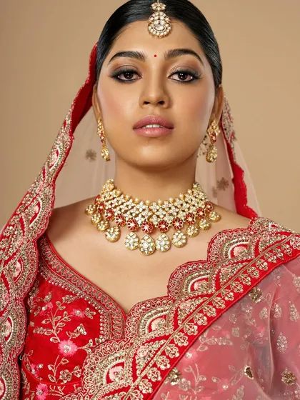 This bridal portrait showcases the power of classic kohl eyes. Paired with a flawless base and a neutral lip, it's a look that is both strong and elegant.