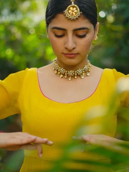 Another detailed shot capturing the mood and traditional jewelry from a Kathak fusion performance. Every detail contributes to the final story.