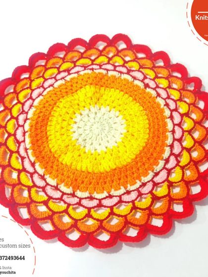 This 15-inch thalposh features a stunning color gradient, moving from white to yellow, orange, and red, creating a warm, sun-like effect.