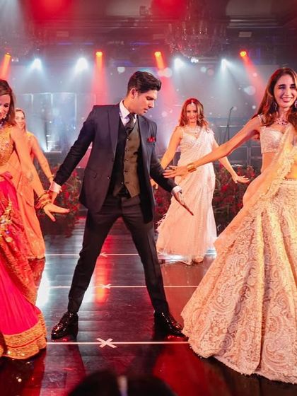 The joyful moment when you see your family come together and celebrate love. We love creating these large family performances that bring everyone onto the stage for a memorable celebration.