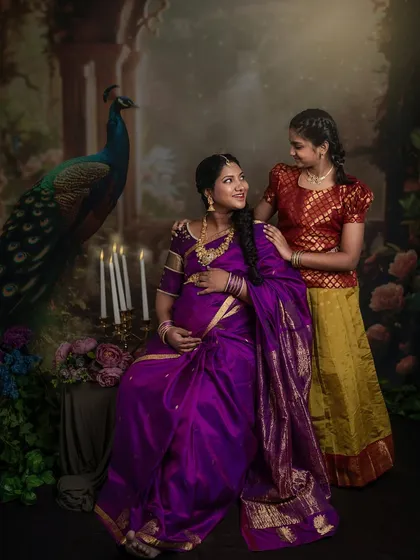A beautiful moment between mother and daughter, their gazes connecting, telling a story of the bond they share as they await the new arrival.