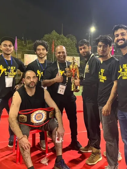 Talent wins games, but teamwork and intelligence win championships. Our team celebrating a successful run at the National Kickboxing Championship.