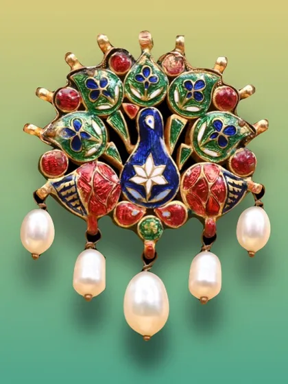An isolated view of the stunning enamel peacock pendant, adorned with pearls. This image allows a clear appreciation of the artistry involved in its creation.