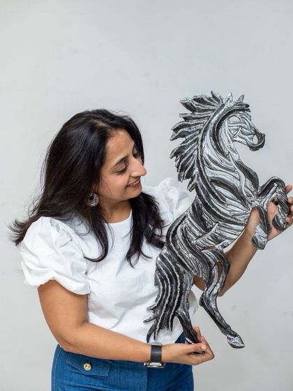 Admiring "The Rising Horse." Its dynamic, rearing pose captures a moment of pure power and ambition.