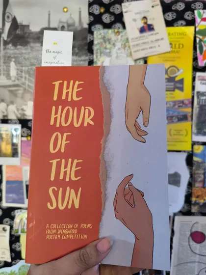'The Hour of the Sun', another one of our beautiful anthologies, held against a backdrop of inspiration. This book contains the poem "Bloom" by a commendable mention winner.