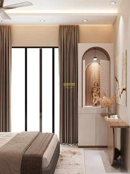 A detail shot of the mandir and console ledge in the parents' bedroom at ATS Rhapsody. The semi-closed jaali doors on the mandir add a traditional touch to the modern European design.