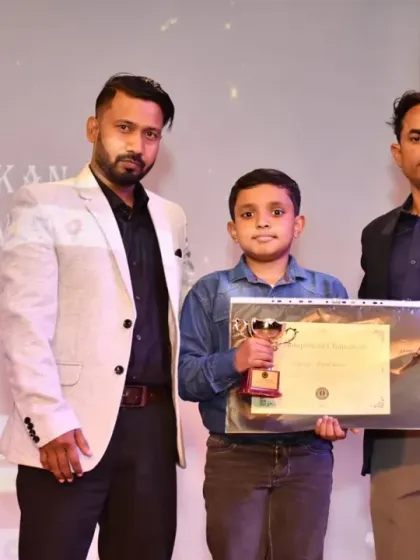 A young student receiving his award at the Sanshinkan ceremony. We celebrate success at every age.