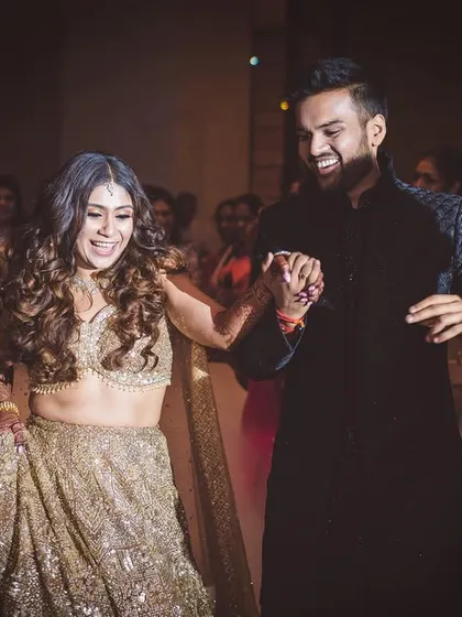 This couple's dance was all about smiles and pure joy. I choreographed a fun, easy-going routine that let their happy energy shine, with a low smoke effect adding a touch of magic.