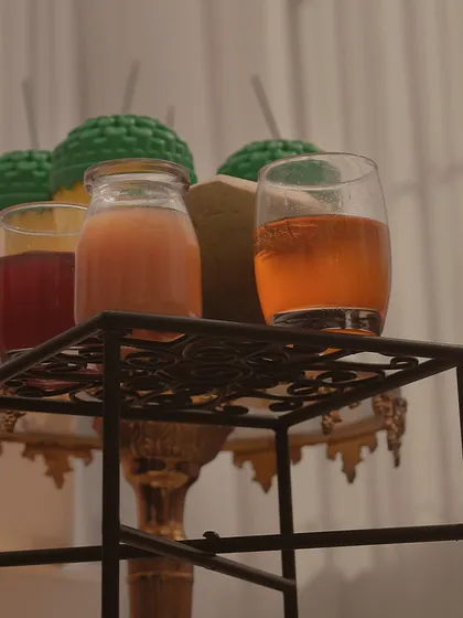 A selection of colorful welcome drinks ready for guests. We ensure the first impression is one of refreshment and thoughtful hospitality.