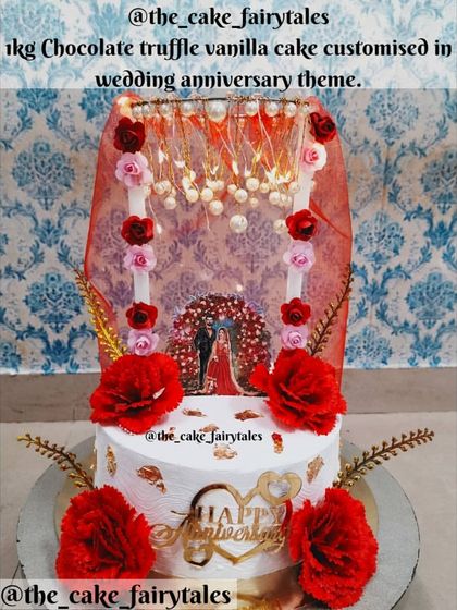 A clear, full-view image of the 1kg Chocolate Truffle Vanilla cake with a wedding anniversary theme and lights.