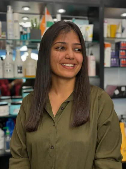 Silky perfection is achievable. This client is thrilled with her hair smoothening treatment, which left her locks glossy, straight, and easy to manage.
