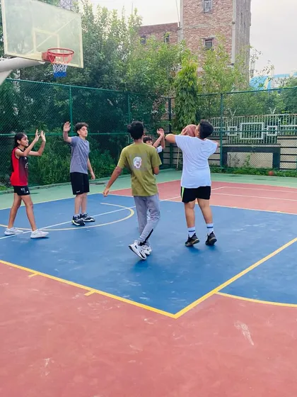 Players learn to play defense as a team.