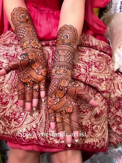 A gorgeous floral mehendi with a focus on rose motifs. The use of shading gives the flowers a three-dimensional appearance.