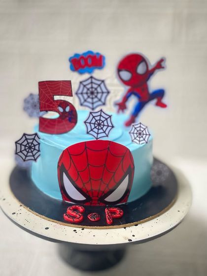 The final look of our Spiderman cake, complete with the birthday boy's initials.