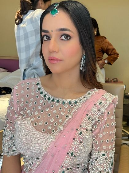 Another shot of the court wedding look, highlighting the flawless skin and the way the makeup enhances the bride's natural features without being overpowering.