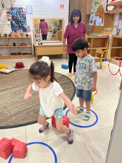 Our Movement Exploration program uses obstacle courses, rings, and music to build skills. Children develop coordination, teamwork, and imagination as they jump, balance, and follow rhythms, learning to control their bodies in space.