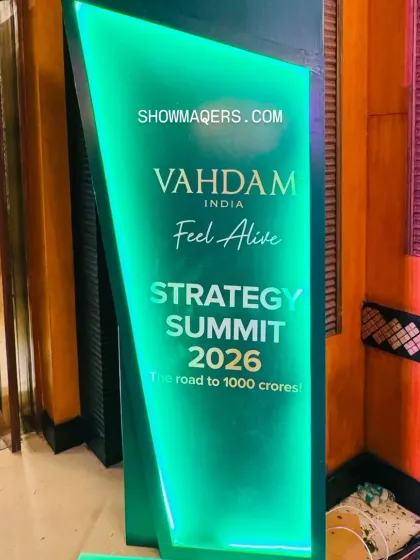Branded signage is key for reinforcing the event's identity. This custom-fabricated, backlit sign clearly displayed the Vahdam Strategy Summit's theme and branding, serving as both a directional marker and a photo opportunity.