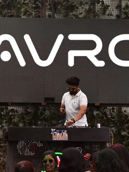 A shot from a massive Holi festival. I love playing outdoor events and bringing a unique energy that matches the occasion, whether it's with vibrant colors or high energy beats.