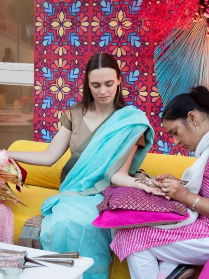 We ensure that guests from all over the world get to experience and enjoy Indian wedding traditions like applying mehendi in a comfortable and beautiful setting.