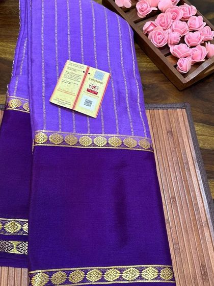 A close-up of the purple wrinkle crepe saree with its Silk Mark tag.