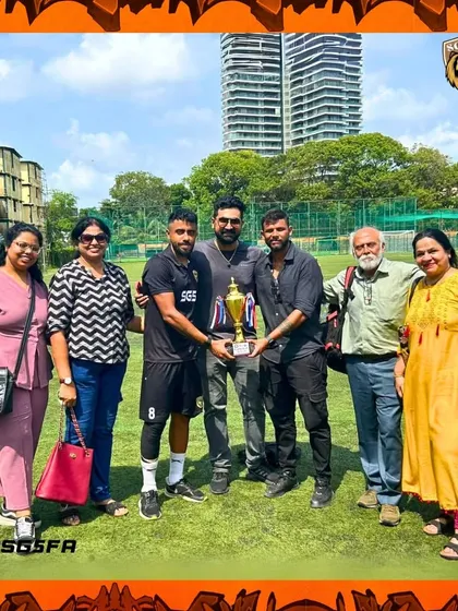 A family affair. Our players and their families celebrating the team's achievement together on the pitch.