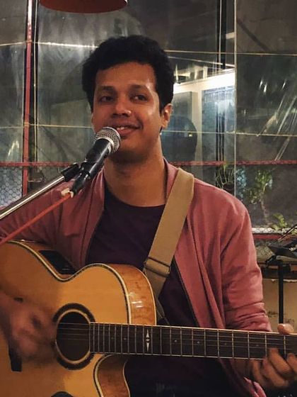 A smiling shot from my gig at Leaping Windows in Mumbai. It was a really cozy and intimate show, and I love when the audience feels close.