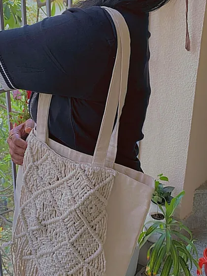 Here's one of my upcycled macrame tote bags being used. It's a great, eco-conscious alternative to plastic bags for shopping or carrying your daily items.
