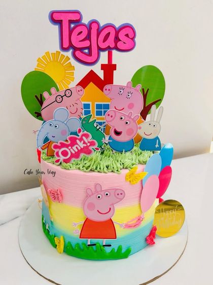 Oink. A colorful Peppa Pig cake, perfect for jumping into a new year. The rainbow frosting and happy characters make it a cheerful centerpiece.