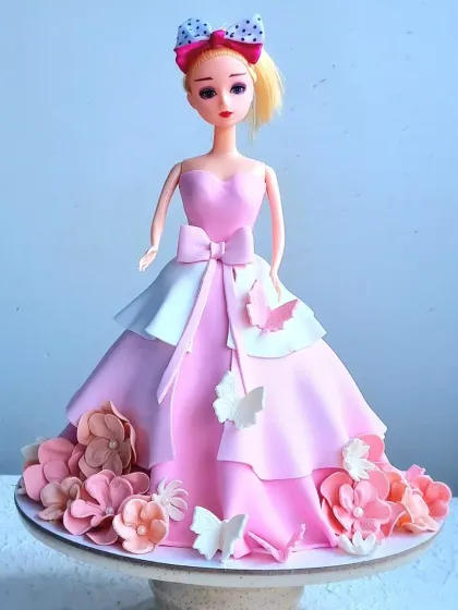 A full shot of the Barbie doll cake, showing the complete dress and doll.