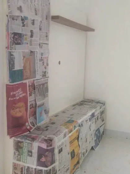 This TV unit is completely covered before the surrounding walls are painted. This attention to detail ensures your wooden furniture remains pristine.