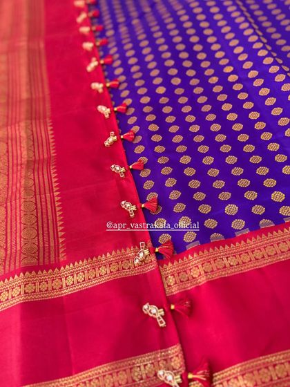 A detail of the half-saree border, showing the delicate tassels and jewellery-inspired latkans that add a finishing touch of elegance.