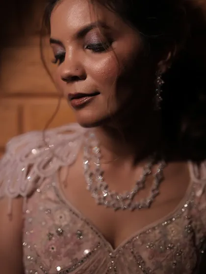 A close-up of the bride's sangeet makeup, highlighting the soft shimmer on her eyes.