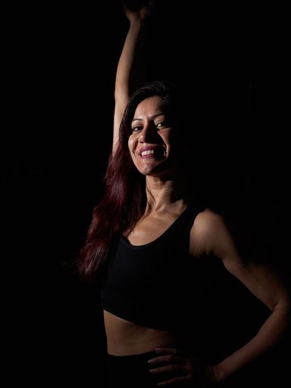 Another one of our incredible instructors, arm raised in triumph. This is the feeling of empowerment we strive for.