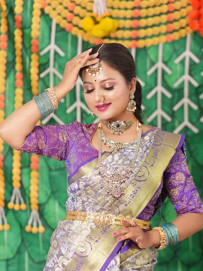 This bride chose a Victorian-style choker and haram set for her reception. The intricate design and subtle sparkle are perfect for an elegant evening look.