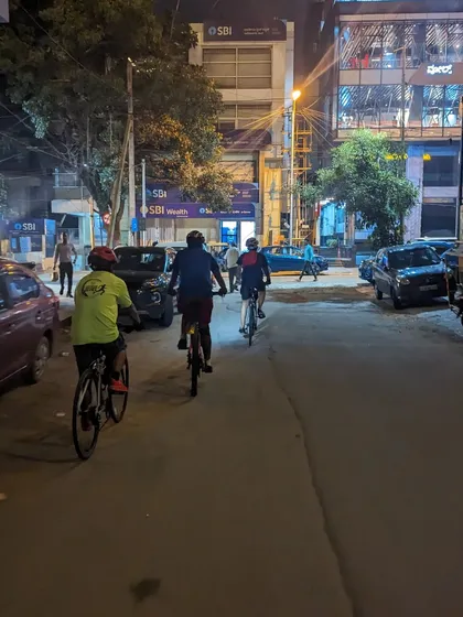 Three riders navigating the streets of Indiranagar at night. The empty roads allow us to ride side-by-side, chatting and enjoying the journey together.