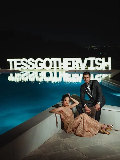 A final, powerful shot from the reception. The couple looks like they are on a movie poster, with Tessa's glam makeup and hair completing the stunning visual.