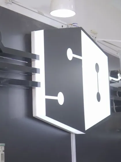 Our logo, illuminated at our booth during the Smart Home Expo. We are proud to stand behind the technology we build and the brand we have created.