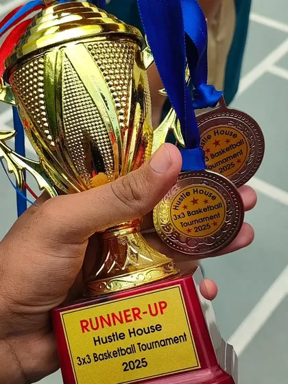 A close-up of the runner-up trophy and medals from the Hustle House 3x3 Tournament. Even in tight competition, our youth team showed incredible fight and skill, proving they are ready for any challenge.