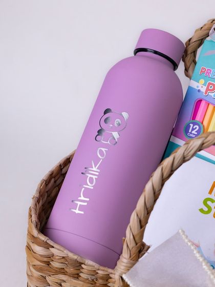 Another shot of the personalized 'Hridika' water bottle, a practical and fun item for a kid's hamper.