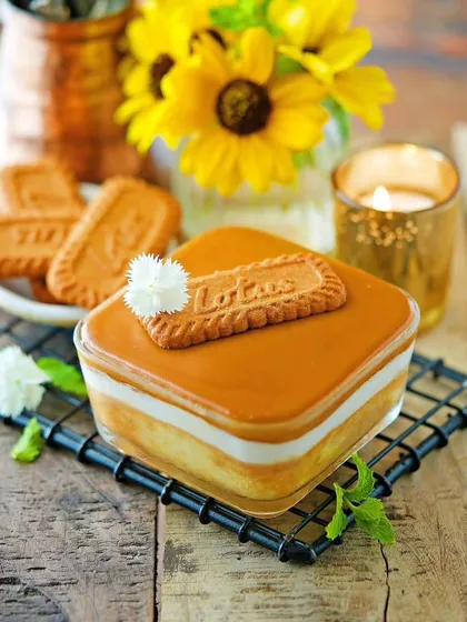A modern classic, our Biscoff Tres Leches cake. A light sponge soaked in three kinds of milk and topped with a creamy Lotus Biscoff spread.